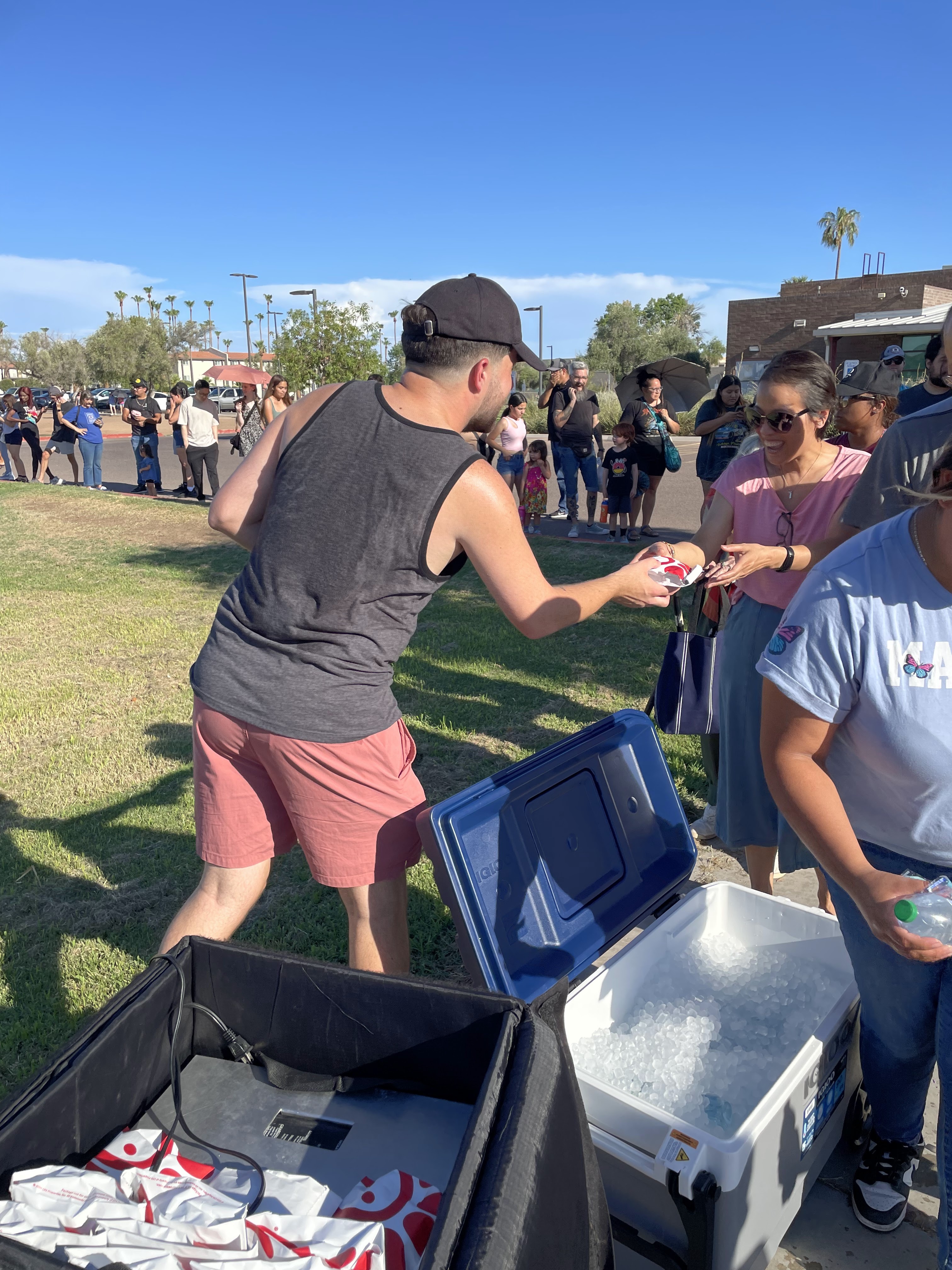 Seth Wilson handing out food at a community event