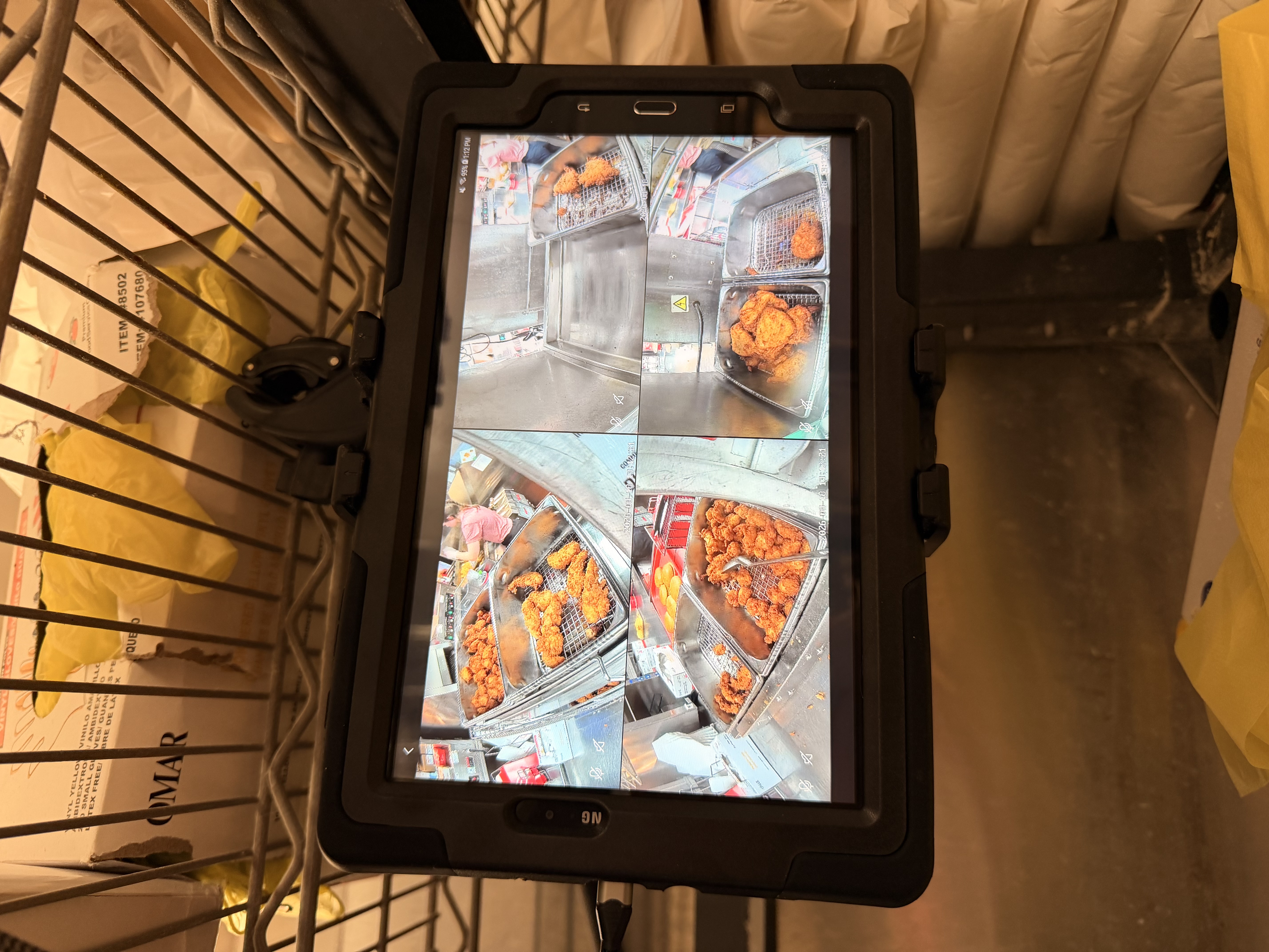 Kitchen camera monitor view of fry stations